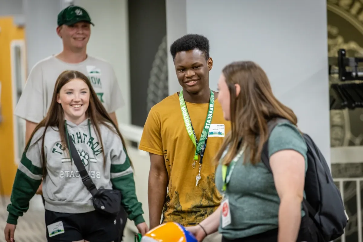 Students walk with their SOAR leader on the third floor of the student union.