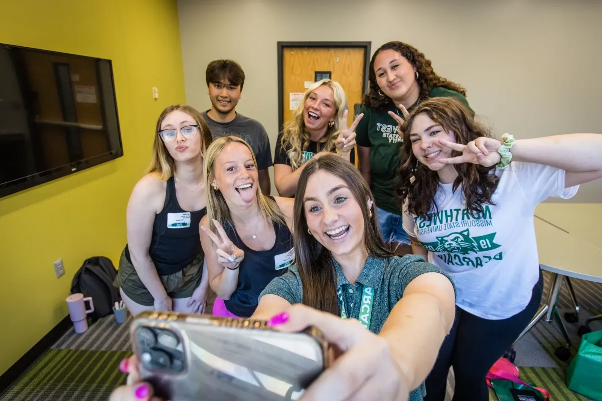 Students take a selfie with their SOAR leader.